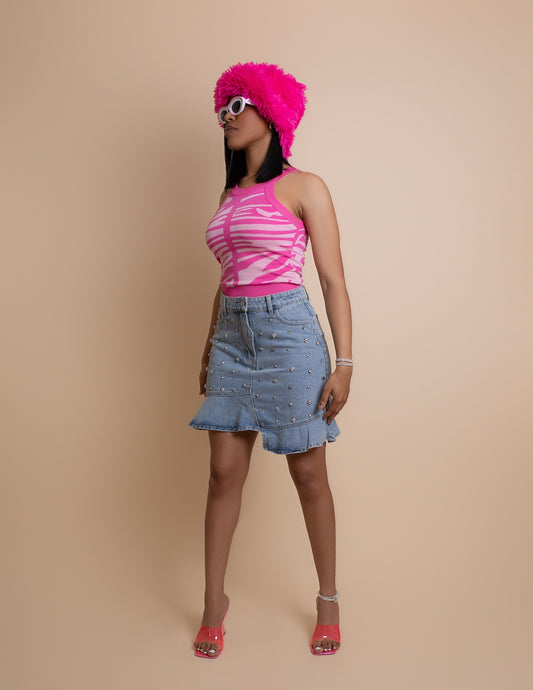 Top de punto rosa con estampado de cebra